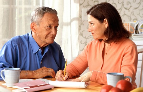 man-and-woman-looking-at-each-other-in-conversation